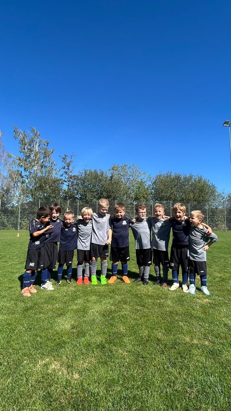 Team Arm in Arm auf dem Rasen